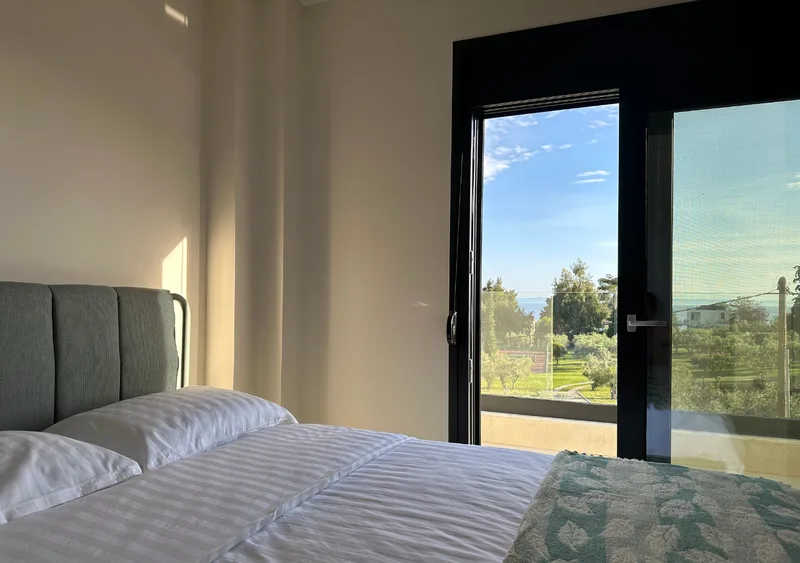 Upper floor bedroom with stunning sea view in Gyalia House No. 3 Nikiti Sithonia