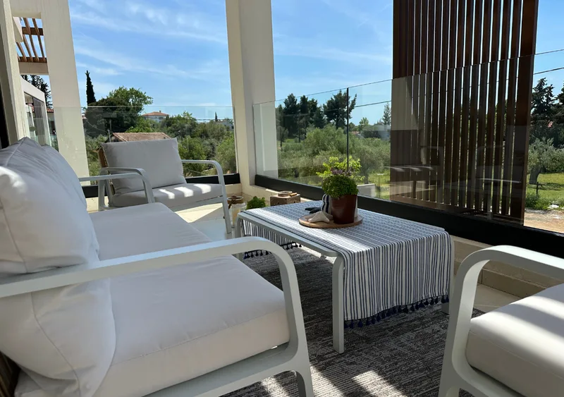 Spacious front terrace with sea view and greenery in Gyalia House No. 3 Nikiti